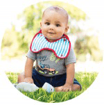 baby_boy_wearing_bow_bib.fw